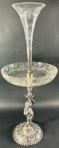 A late Victorian silver plated table centre epergne with a removable cut glass trumpet vase over a