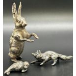 A silver pepper pot in the form of a hare, unclear hallmarks to inner neck (af foot missing) 6.5cm