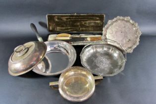 A mixed selection of silver plated items, including a scrolled edged drinks trays a fruit dish