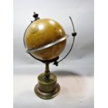 Late 19th century terrestrial globe clock - The Empire Clock, patent 19460, raised on a fluted brass