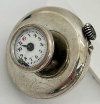 An unusual early 20th century German silver cased lapel watch, serial no 7376, 30mm case (back),