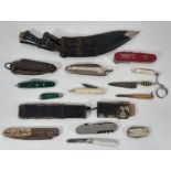 Collection of vintage penknives small kukri, WWI troopers knife, etc