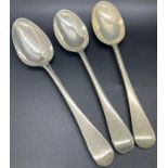 A mixed selection of 1930s silver flatware including five serving spoons, three dessert spoons, a
