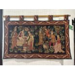 An old style tapestry, of French wine makers harvesting and treading grapes, 96cm x 56cm