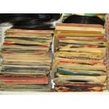 A quantity of 45rpm singles (200 approx) together with a collection of Manchester United 'United