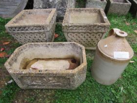A pair of Cotswold Studios weathered cast composition stone square tapered planters with repeating