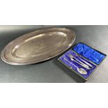 A Christofle silver plated oval serving platter 49 cm long (light to heavy scratching all over)