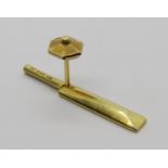 A novelty 9ct yellow gold tie pin in the form of a cricket bat, with pinch button clasp, 3cm long,