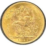 George V gold sovereign dated 1927, circulated, contained in a circular container