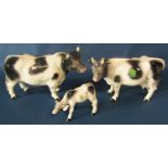 A collection of Melba ware animals including a Friesian Bull, Cow and Calf, together with a