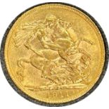 George V gold sovereign dated 1911, circulated, contained in a circular container