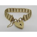 9ct gate link bracelet with heart padlock clasp, 13.2g