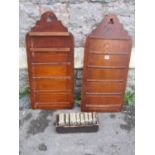 A pair of oak chapel hymn boards, with simple pierced trefoil detail, together with a simple stained