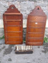 A pair of oak chapel hymn boards, with simple pierced trefoil detail, together with a simple stained