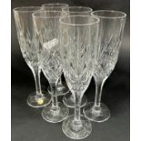 Six slender cut glass champagne flutes, six similar wine glasses, other various matching wines, etc