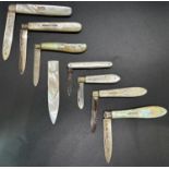A collection of seven mother of pearl and silver fruit knives, various makers, together with a