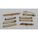 Collection of antique 9ct bar brooches and tie pins, 15.9g total (8)