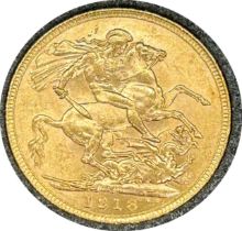 George V gold sovereign dated 1918, circulated, contained in a circular container