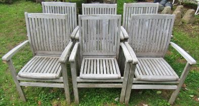 A set of six good quality Bramblecrest weathered teak garden open armchairs with slatted seats and