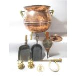 A 19th century copper cauldron shaped coal bucket with a brass handle, a poker, set of bellows,