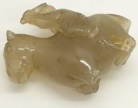 A Chinese pale carved jade figure, horse and rider (A/F) (partial) 7cm high, 17cm long (displayed in