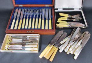 A mahogany cased set of six fish knives and forks, another small set and a selection of further