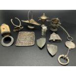 A collection of miniature silver items to include two trophies, a wicker fruit basket, wishbone menu