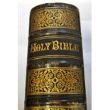 A Victorian family bible (1869) with coloured illustrations, together with a polyglot bible, English