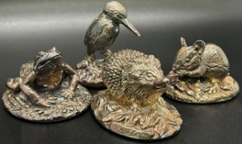 An early 20th century silver collection in the form of woodland animals to include hedgehog,