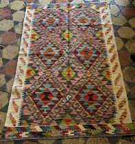 A Chobi Kilim, with a multicoloured all over geometric pattern,136cm x 86cm