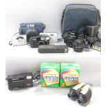 A selection of cameras including a Fuji film Instax, a Canon Sure Shot, a Helina camera, a