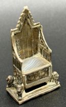 A miniature silver coronation chair, with marble seat, Birmingham 1901, maker Levi & Salaman, 4.