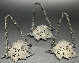 Three silver decanter labels in the form of vine leaves, London 1830's maker Edwards II, together