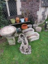 A two seat garden bench with weathered timber lathes, together with a pair of light steel