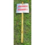 A steel Private Fishing sign mounted on a simple pine baton, 31cm square x 105cm high