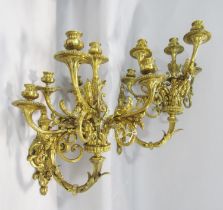 A pair of good quality Georgian style ormolu four branch wall sconces, with acanthus leaf fronds