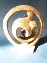 A late 20th century modernist marble sculpture of 'The Eternal Bond', 47cm high approx.