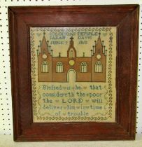 A George III English cross stitch embroidered sampler decorated with a church facade and scripted