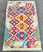 Chobi kilim with a multi coloured over all geometric pattern 128 x80cm approx.