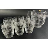 Collection of mid-20th century Stuart Crystal glasses including a vine leaf decorated jug and six