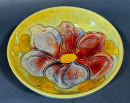 Moorcroft Anemone pattern dish on raised foot, 14cm diameter