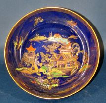 Two Carltonware blue ground porcelain bowls, decorated with pagoda landscapes, 10 cm high, 14 cm