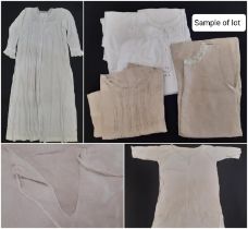 A collection of good quality early 20th century garments in linen and white cotton, mainly French