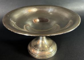 A silver tazza, Birmingham 1914, maker Levi & Salaman with a 20 cm wide bowl raised on a circular