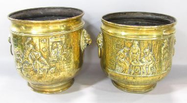 A pair of brass coal buckets with embossed tavern scenes and lion mask handles (one lacks ring) 26cm