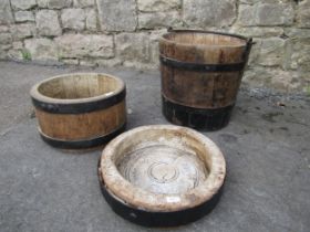 Historic agricultural equipment to include a coopered pale, cheese wheel case, etc