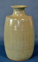 A group of Studio ware items to include a slipware type flagon, a large blue ground vase and two