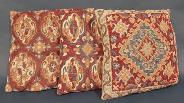 Three Kashmir type crewelwork cushions, all approx 40x40cm (3)