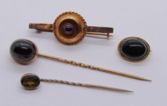 Group of antique gem set yellow metal jewellery comprising a carbuncle garnet stick pin, further