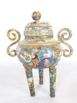 An antique bronze Cloisonné incense burner with pierced cover and scrolled handles, raised on